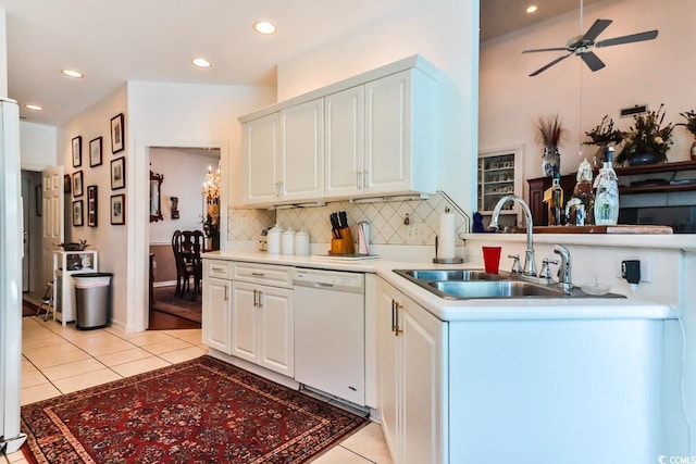 3412 Westminster Dr, Myrtle Beach, SC 29588 - kitchen featuring backsplash, a sink, white dishwasher, light tile patterned floors, and ceiling fan