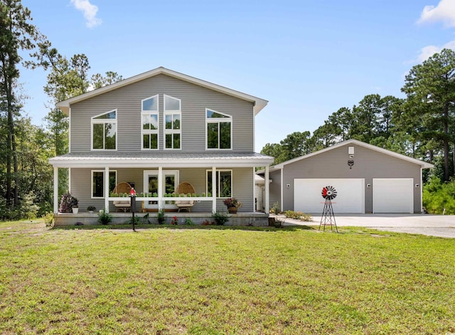 view of front of property featuring metal roof, a porch, and a front lawn