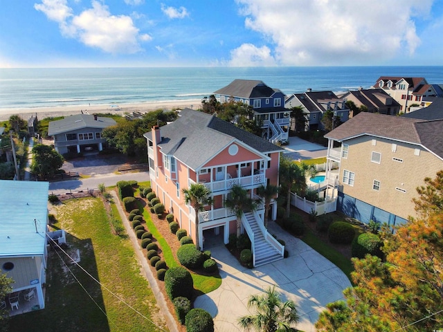 aerial view featuring a beach view and a water view