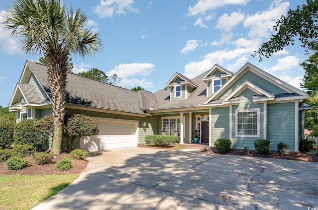 view of front of home with a garage