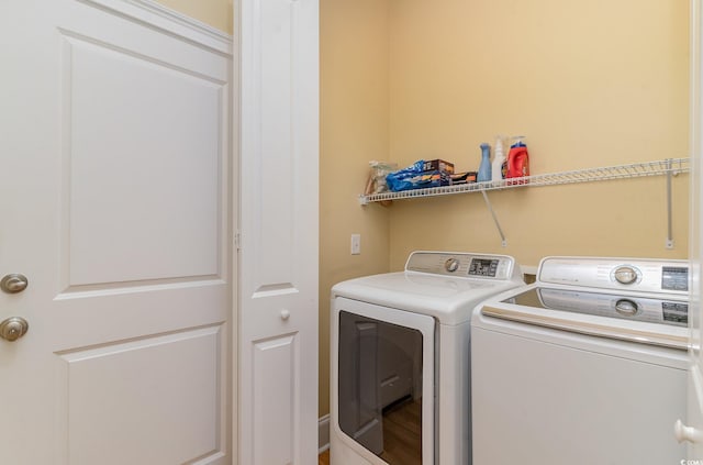 washroom featuring separate washer and dryer