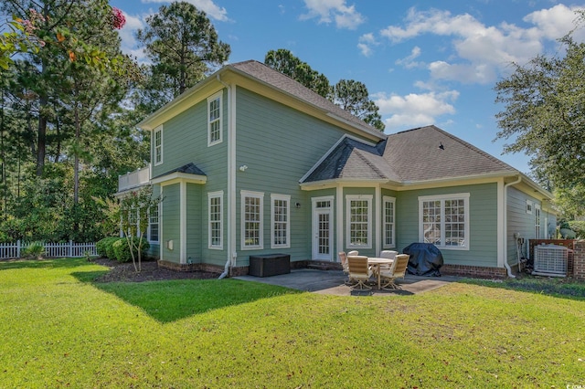 back of house with a patio, a yard, and cooling unit