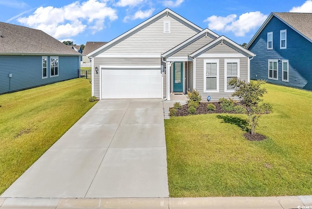 view of front of home featuring a front yard and a garage