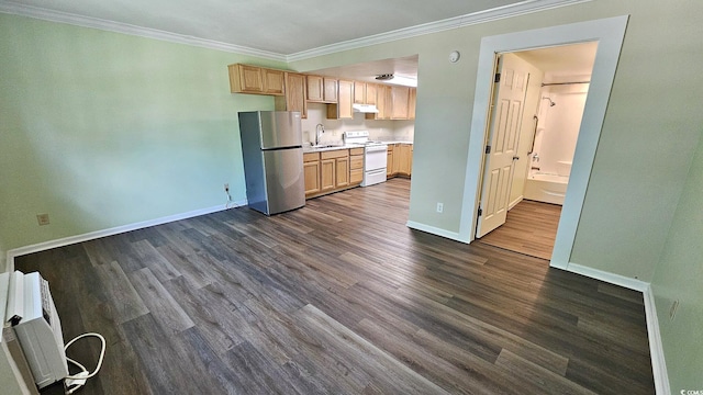 kitchen featuring light countertops, freestanding refrigerator, white electric range, and light brown cabinets