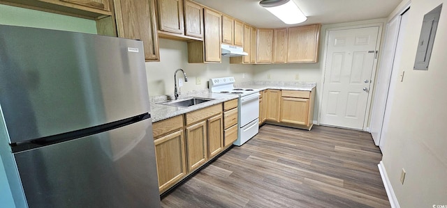 kitchen with wood finished floors, freestanding refrigerator, white electric range, under cabinet range hood, and a sink