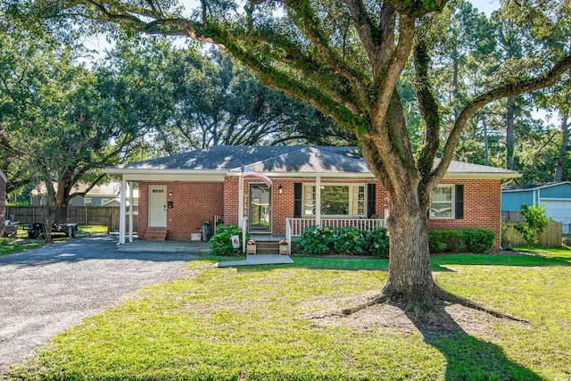 single story home featuring a front lawn