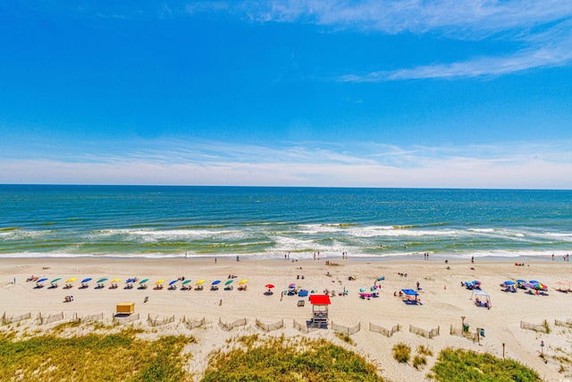 property view of water featuring a beach view