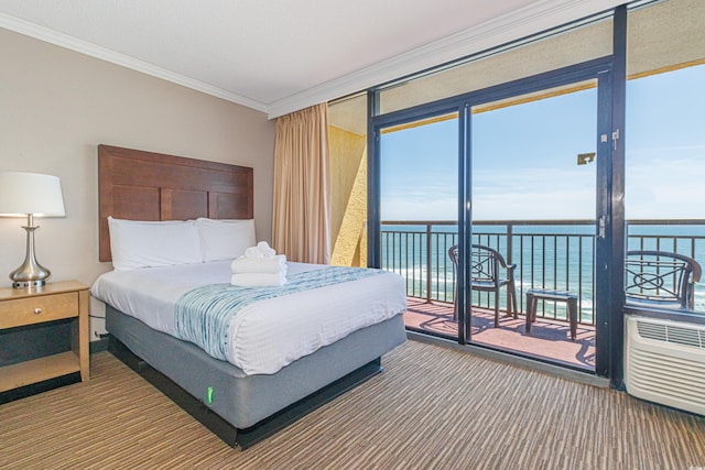6900 N Ocean Blvd Unit 812, Myrtle Beach, SC 29572 - bedroom featuring access to outside, crown molding, a water view, and carpet flooring