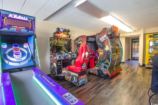 playroom with dark hardwood / wood-style floors