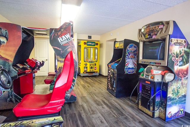 recreation room featuring dark hardwood / wood-style floors