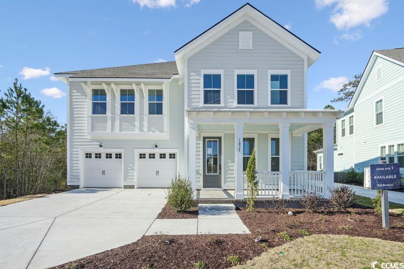 1035 Milford Way, Myrtle Beach, SC 29588 - view of front of house with covered porch, concrete driveway, and a garage