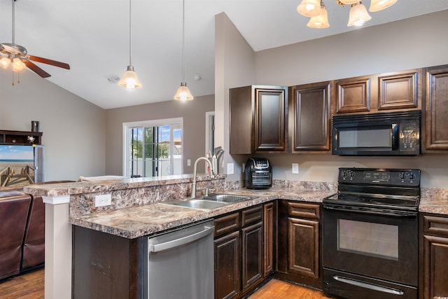 kitchen featuring black appliances, kitchen peninsula, sink, ceiling fan, and light wood-type flooring