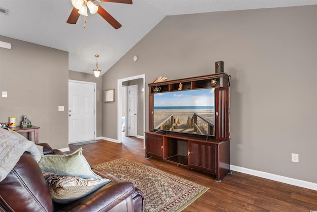 living room with high vaulted ceiling, ceiling fan, and dark hardwood / wood-style flooring