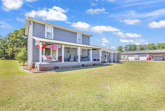 view of front facade with a garage, covered porch, and a front lawn