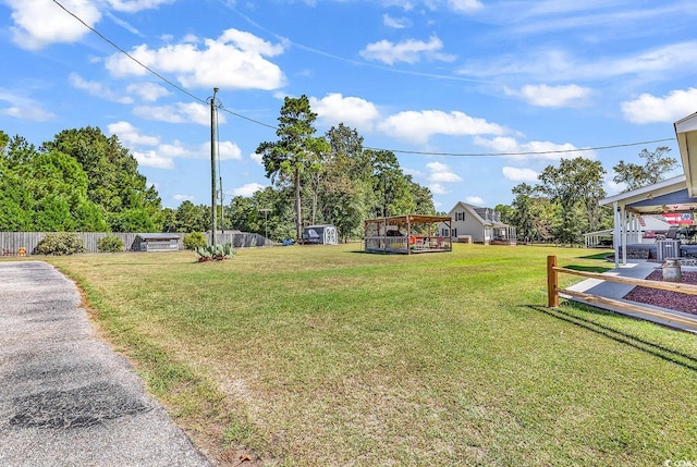 view of yard featuring fence