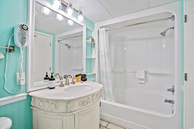 bathroom with vanity, tile patterned flooring, and shower / bath combo