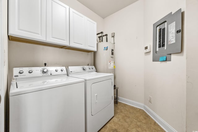 laundry area featuring cabinets, light tile patterned floors, water heater, washing machine and clothes dryer, and electric panel