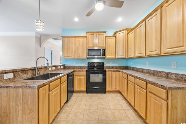 kitchen with pendant lighting, black appliances, crown molding, sink, and ceiling fan