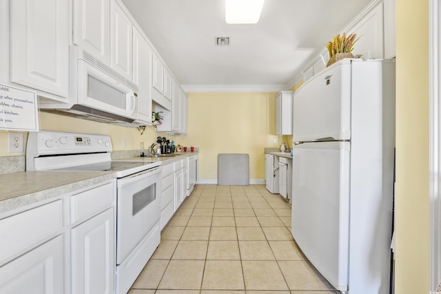 kitchen with ornamental molding, white cabinets, white appliances, sink, and light tile patterned flooring