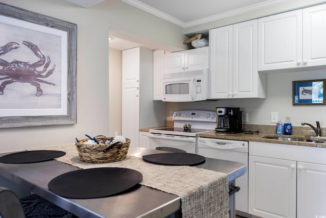 kitchen featuring white cabinetry, white appliances, ornamental molding, and sink