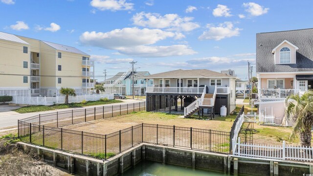 dock area with a deck with water view