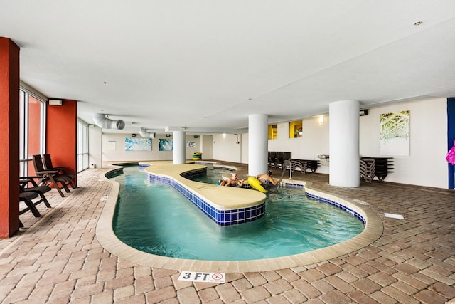 view of pool featuring a jacuzzi