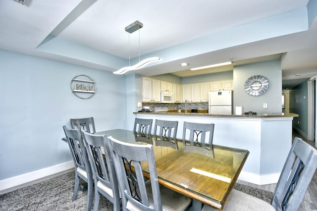 dining room with sink