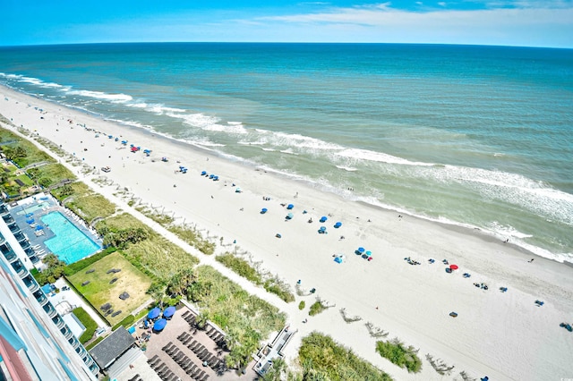 bird's eye view with a view of the beach and a water view