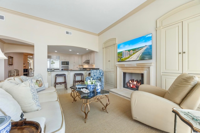 living room with ornamental molding