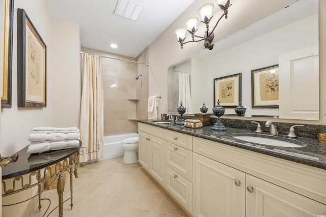 full bathroom featuring tile patterned floors, toilet, a notable chandelier, shower / bath combination with curtain, and vanity