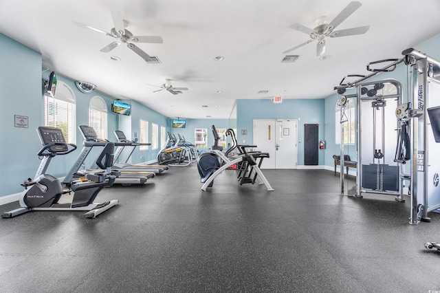 exercise room with ceiling fan