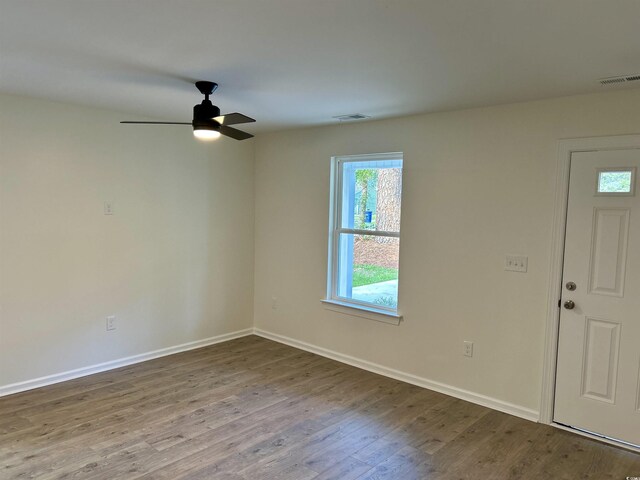 74 Greentown Rd, Georgetown, SC 29440 - foyer entrance with ceiling fan, wood finished floors, and baseboards