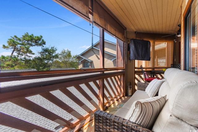 wooden deck featuring an outdoor hangout area