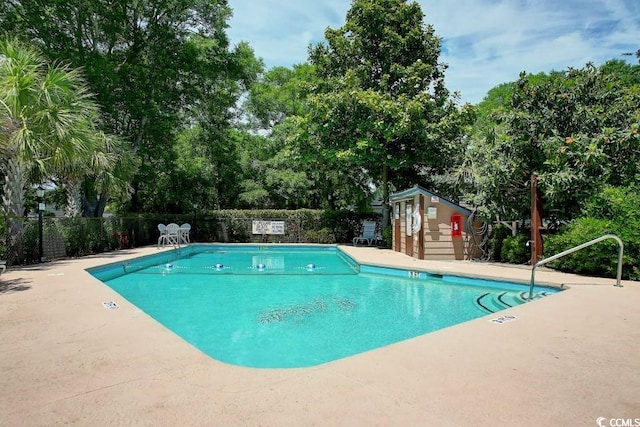 view of pool featuring an outdoor structure