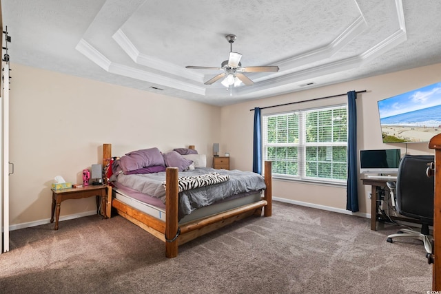 bedroom with crown molding, a raised ceiling, ceiling fan, and carpet floors