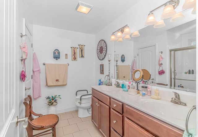 bathroom with toilet, an enclosed shower, tile patterned floors, vanity, and a chandelier