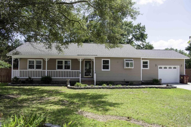 ranch-style home with a porch, a garage, and a front lawn