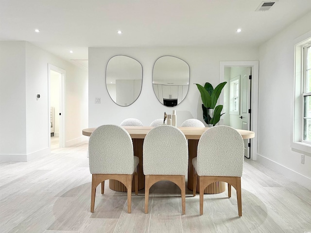 dining area featuring light hardwood / wood-style flooring