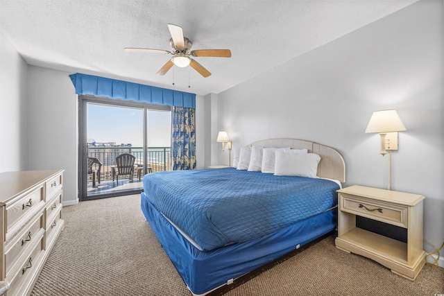 bedroom with ceiling fan, a textured ceiling, access to outside, and carpet floors