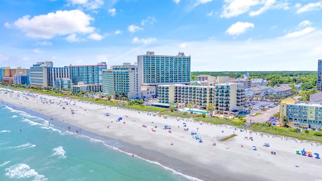 aerial view with a view of the beach and a water view