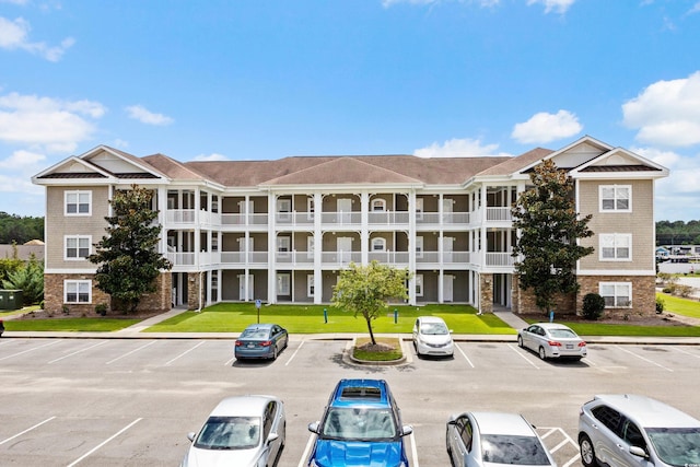 124 S Shore Blvd Unit 303, Longs, SC 29568 - view of property featuring uncovered parking