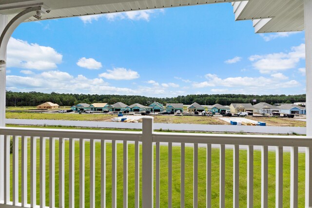 124 S Shore Blvd Unit 303, Longs, SC 29568 - view of grassy yard with a residential view and a balcony
