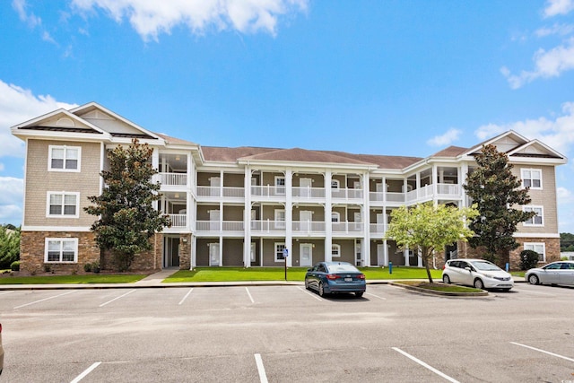 124 S Shore Blvd Unit 303, Longs, SC 29568 - view of apartment building / complex with uncovered parking
