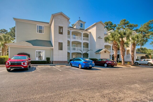 exterior space featuring a balcony