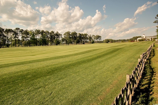 view of home's community featuring a lawn