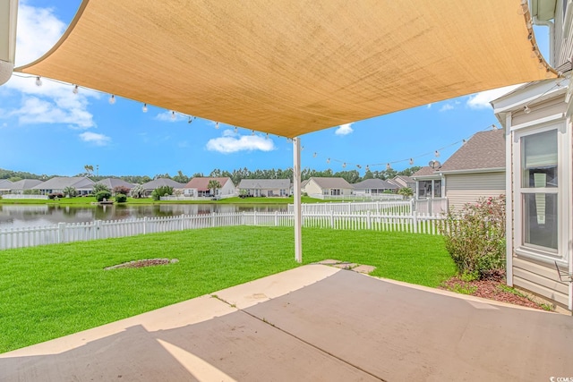 view of patio featuring a water view