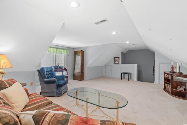 interior space featuring lofted ceiling and light colored carpet