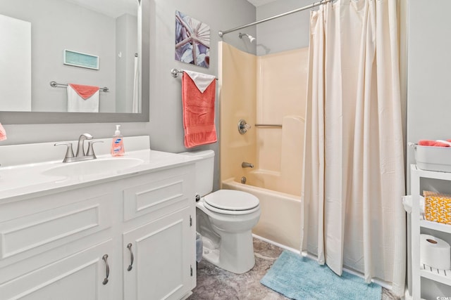 full bathroom featuring vanity, shower / bath combo with shower curtain, and toilet