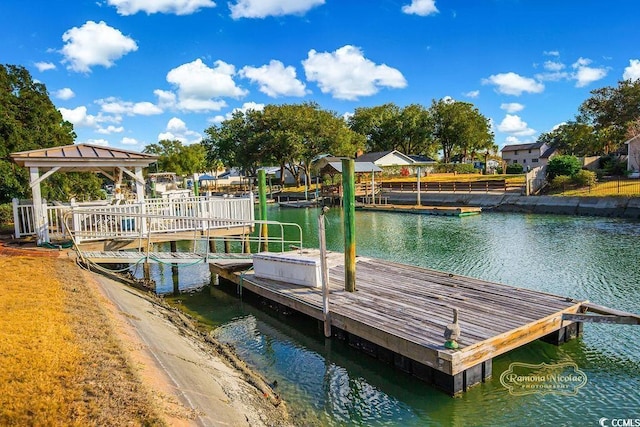 dock area featuring a water view