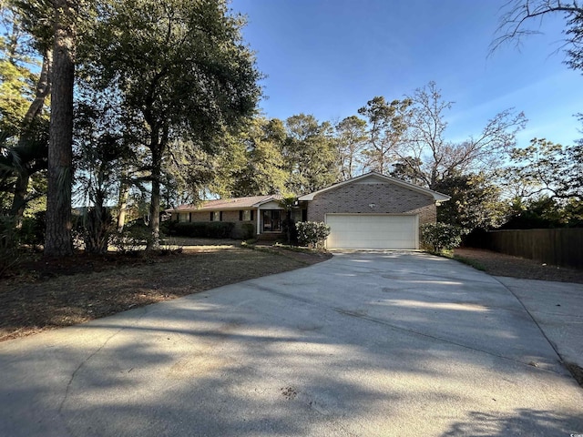 single story home with a garage